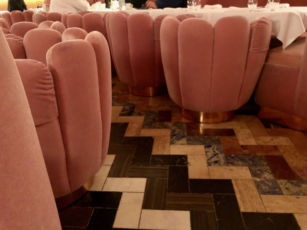 Pink clamshell chairs at Sketch London