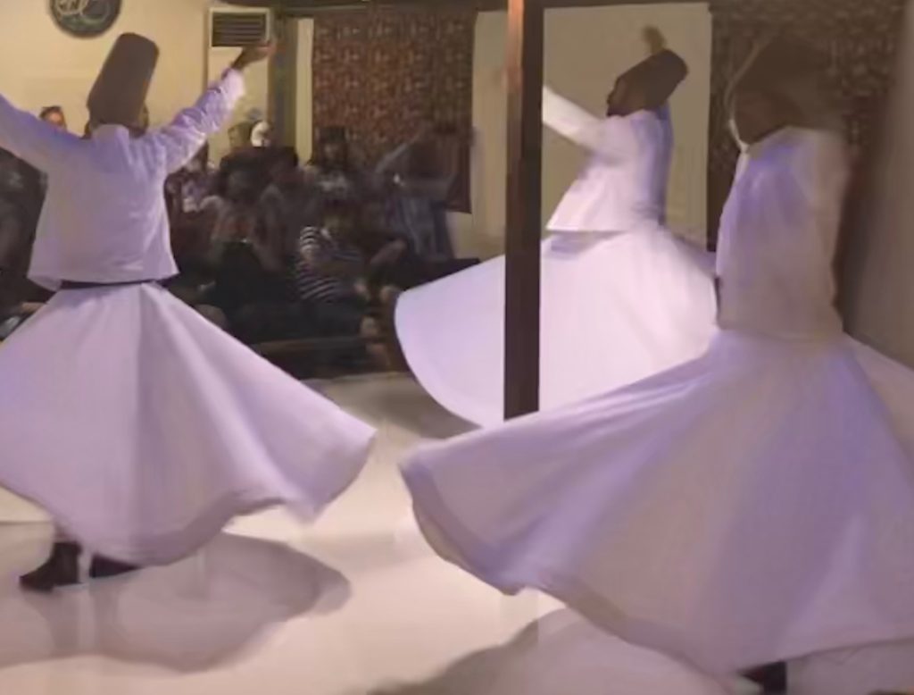 whirling dervish performs
