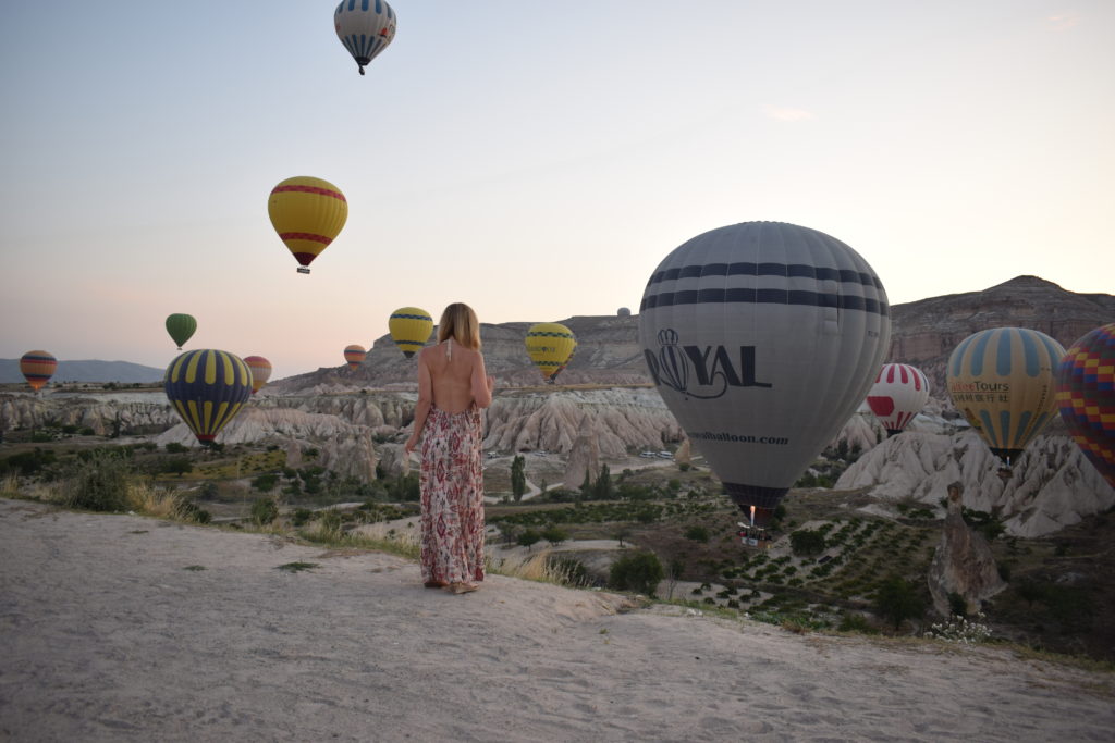 walking amongst the hot air balloons in cappadocia